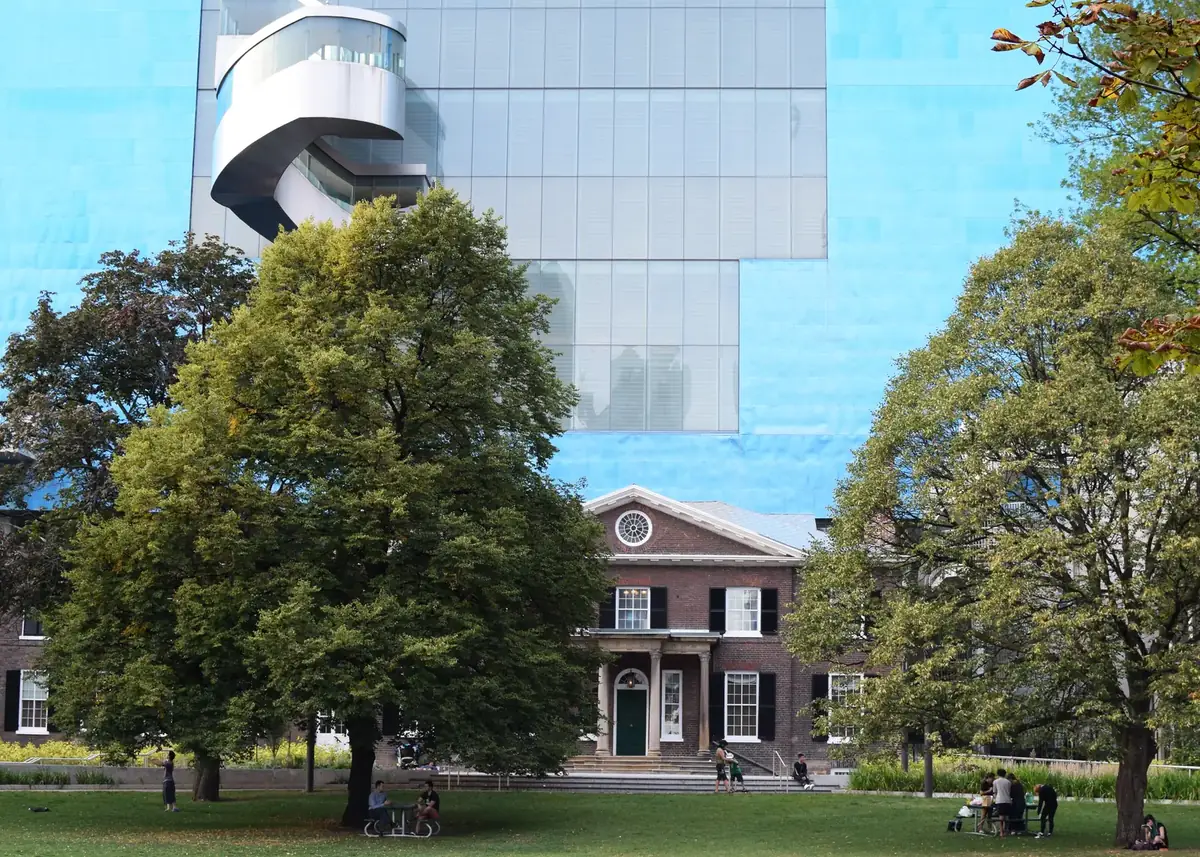 The Grange and the Art Gallery of Ontario above the trees and lawn of Grange Park, on the edge of Toronto’s Chinatown