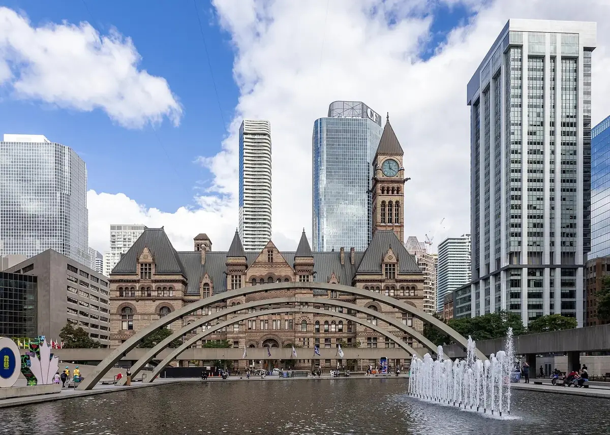 Old City Hall and downtown towers seen across the fountain at Nathan Phillips Square, Toronto