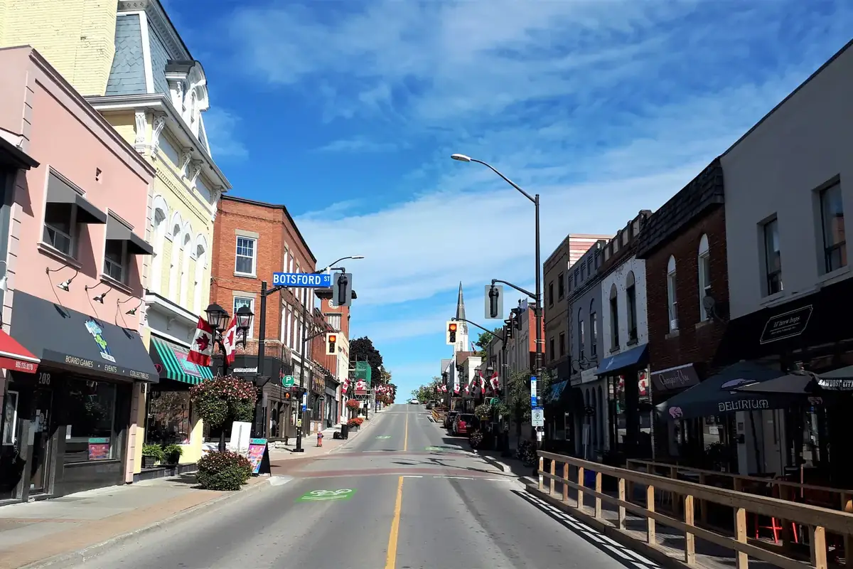 Heritage storefronts under a blue sky on Main Street South in downtown Newmarket