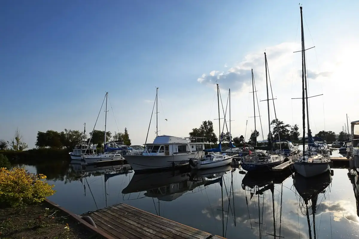 Sailboats reflected in calm water at Frenchman’s Bay Marina, Pickering