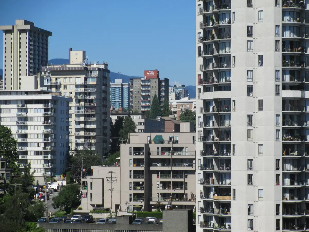 Apartment towers and low-rise rental buildings of Vancouver’s West End, seen from the Burrard Street Bridge
