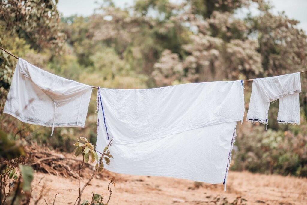 White laundry drying on an outdoor clothesline