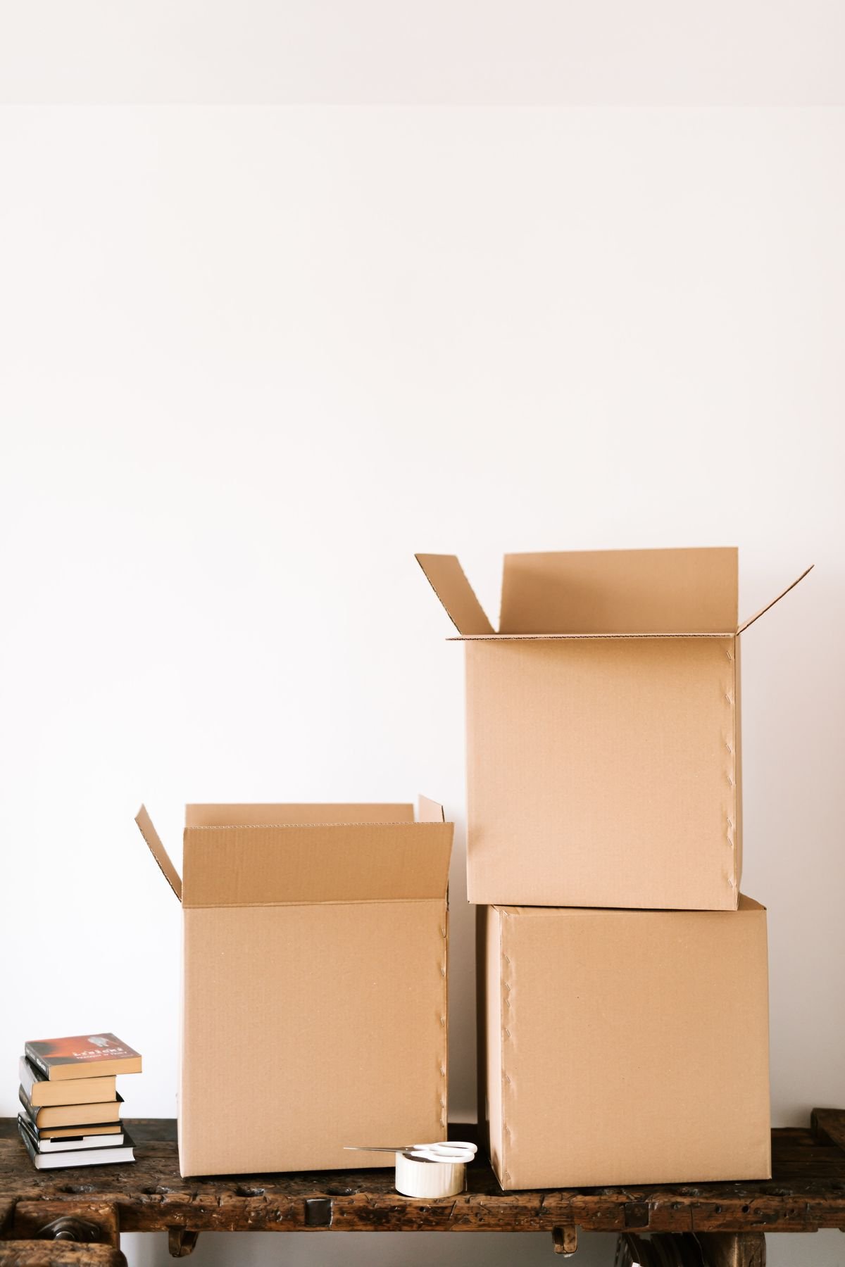 Cardboard moving boxes with packing tape ready for a move-out